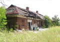 The Pawhuska Midland Valley Depot survives in a state of ruin.