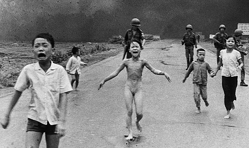 June 8, 1972: Kim Phúc, center left, running down a road naked near Trảng Bàng after a South Vietnam Air Force napalm attack (Nick Ut / The Associated Press)