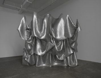 Alyson Shotz, Object for Reflection, punched aluminum and stainless steel rings, 122.5" x 145" x 57", 2017. Guggenheim Museum Bilbao collection. Alyson Shotz OFR.jpg