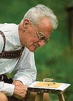 In traditional dress, with his [[honey bee]]s