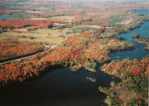 Highway 35 north of Coboconk, showcasing the fall display. Shadow and Silver lakes are visible.