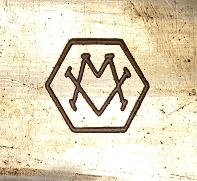MV Logo from brass Waveguide