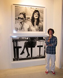 Dweck standing with "Giselle and Rachel" and "Legs" during an exhibit of Habana Libre at Miami Beach's Art Basel in December 2012 MichaelDweck Art Basel Miami.jpg