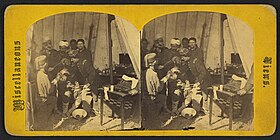 Doctors of the 5th NYIR simulating an arm amputation on a Zouave soldier inside Fort Monroe, Virginia - George Stacy, 1861 Hospital amputation scene, Fort Monroe.jpg