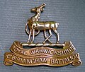 Cap badge, 16th (Service) Bn Royal Warwickshire Regiment, 1914 - 1919.JPG