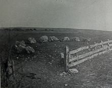 A photograph of the site as it existed in the first decade of the 20th century. Taken during a visit to the site by the Dorset Natural History and Archaeological Society. Hampton Down Stone Circle 1908.jpg