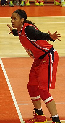 Moore defending an inbound pass during a January 2014 WCBA game in Shanghai. Mayamoore wcba (cropped).jpg