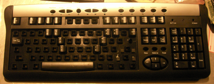 A 104-key USB keyboard adapted into a chording keyboard. All phonetic keystrokes may be accomplished by one and two-key chords of the home keys on the top row.