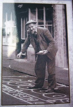 A resident of Knutsford sanding the street in celebration of May Day in 1920 Man Sanding the street in Knutsfrod for May Day 1920.jpg