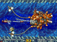 The Granvia fighting Cave Man, the game's first boss (arcade version). ARC In the Hunt (Kaitei Daisenso).png