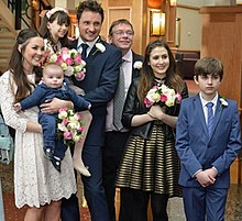 From left to right: Stacey, Arthur, Lily, Martin, Ian, Bex and Bobby in 2016 Beale family (2016).jpg