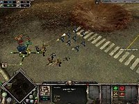 A squad of Space Marines engage a group of Orks next to a Strategic Point. DawnofwarScreen1.JPG