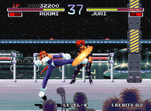 Gameplay screenshot featuring a match between Roomi (left) and Juri (right) fighting each other. NEOGEO Galaxy Fight - Universal Warriors.png