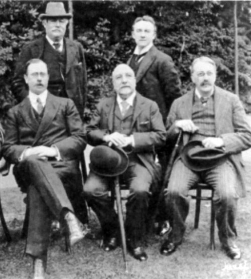 Parry (back l.), in 1910 with Alexander Mackenzie (front c.), Charles Villiers Stanford (front r.), Edward German (back r.) and Dan Godfrey