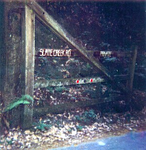 The gated Slate Creek Road entrance to the area. Middleton tract entrance.jpg