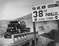 UN Forces crossing the 38th parallel line in Korea during the Korean War 1950 sign denoting the 38th parallel line in Korea.jpeg