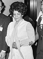 Taylor leaving a courtroom in Chicago during a recess in her trial on March 8, 1977.