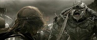 An armoured troll approaches Aragorn during the Battle of the Morannon in The Return of the King Trollaragorn2.jpg