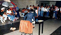 View of the 5th Passage art space at Parkway Parade during Amanda Heng's performance of S/he at the Artists' General Assembly in 1993/4. Photo by Koh Nguang How. 5th Passage AGA 1993-4.jpg