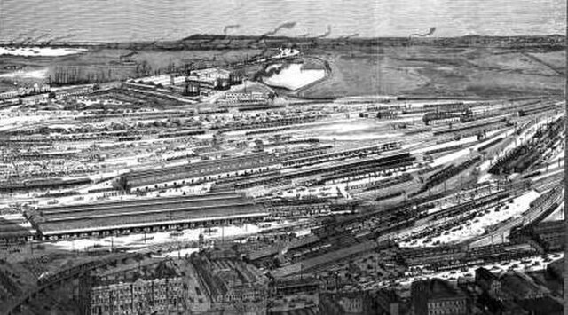 Lithograph of the busy station complex in 1889 looking west from the Hoddle Grid