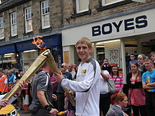 External Awards 2012: VX player Tom Hildreth who was awarded the honour of being an Olympic Torchbearer as a direct result of his achievements in the sport and his community work within the sport Tom Hildreth Torchbearer.jpg