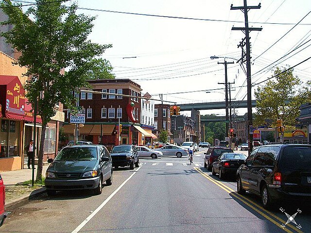 East Falls at Ridge Avenue and Midvale Avenue in September 2006 with the Twin Bridges in the background