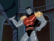 From X-Men: Evolution, Colossus in his armored from and hefting a large stone column as if it were a javelin.