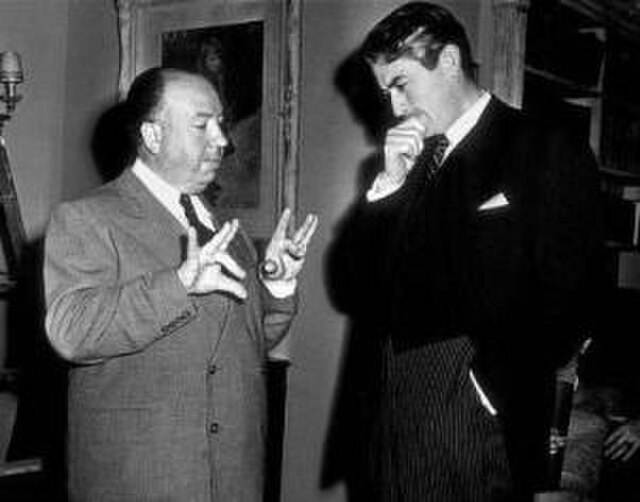 Alfred Hitchcock and Gregory Peck in discussion on the set of The Paradine Case
