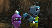 In The Maw characters Frank (right) and The Maw (left) must team up to escape capture from bounty hunters. TheMaw screenshot.png