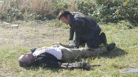 Merle is put down by his brother, Daryl, following his sacrificial death by the hands of The Governor.