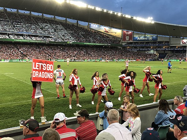 The club's cheer squad, The Flames, performing during the Dragons' Anzac Day match against the Roosters in 2018.