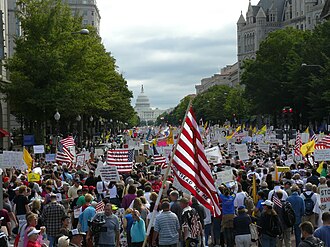 2009 Taxpayer March on Washington as conservative protesters walk down Pennsylvania Avenue, Washington, D. C. TeaPartyByFreedomFan.JPG