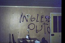 Vandalism of a Falkland Islander's home by Argentine soldiers, the message reads Inglese puto, an insult against people considered weak, unmasculine and contemptible Murrell House Vandalism June 1982.jpeg