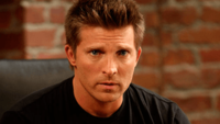 Burton as Jason Morgan, seen wearing a typical black T-shirt, on General Hospital (2010). The actor found Dylan to be more like himself in contrast to Jason. Steve Burton as Jason.png