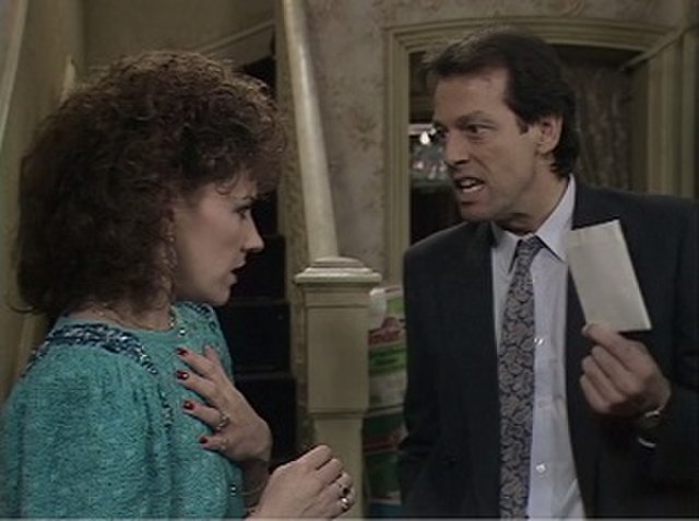 A scene from EastEnders on Christmas Day 1986, watched by 30.15 million viewers. The story, in which Den Watts (Leslie Grantham) served his wife Angie