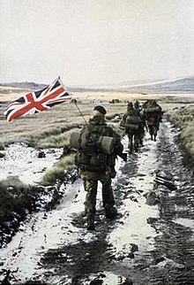 British troops yomp to Stanley Heading into Port Stanley.jpg