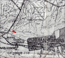 Johannesburg in 1902 and the farm Braamfontein. The arrow points to where Westdene would eventually be situated. Johannesburg and the farm Braamfontein in 1902.png