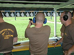 The plebes are certified in rifle and pistol proficiency at the nearby firing range in Naval Station Annapolis using the M16A3 rifle and M9 Standard issue sidearm Pistolcert3928.jpg