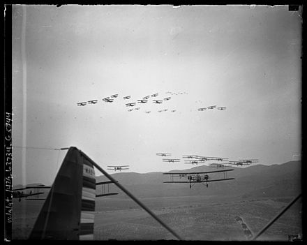Formations of Keystone LB-7s (lower) and Boeing P-12s (upper) on aerial maneuvers over Burbank, California, 1930