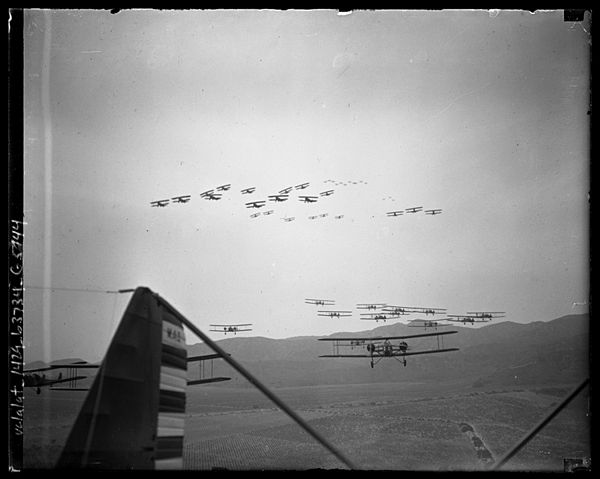 Formations of Keystone LB-7s (lower) and Boeing P-12s (upper) on aerial maneuvers over Burbank, California, 1930