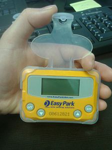 An example of an in-vehicle parking meter, the EasyPark device by On Track Innovations