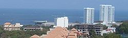 Pattaya Exhibition and Conference Hall (PEACH), Royal Cliff Bay, Pattaya, viewed from south. See helipad at left of PEACH roof structure, overlooking the Gulf of Thailand. Pattaya Exhibition and Conference Hall (PEACH).jpg