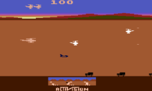The player's helicopter (left) dealing with two enemy helicopters and a jet. Chopper command.png