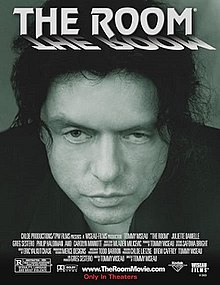 A black-and-white poster for the movie shows Tommy Wiseau's face looking directly at the viewer.