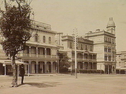 An 1890 photograph of Fitzroy Street looking toward the three blocks that made up the George Hotel