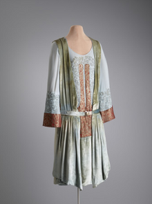 (9) Afternoon dress with bands of cotton and metallic gold thread, early 1920s 1920ThurnAfternoonDress.png