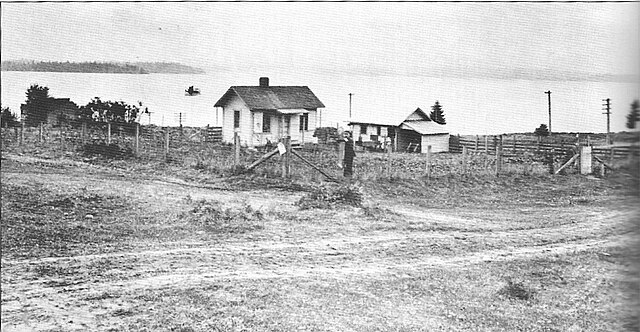 Kirkland in 1912, at the modern-day intersection of Fourth Avenue and First Street overlooking Lake Washington