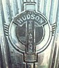 A metallic badge from an abandoned Hudson Terraplane in Kathmandu, Nepal