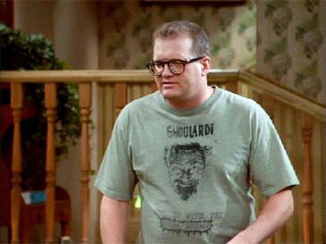 Drew Carey wearing a Ghoulardi T-shirt on The Drew Carey Show