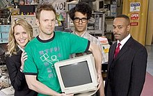 The main cast of the American version (left to right) Jen, Roy, Moss, and Denholm IT Crowd Cast American Version.jpg